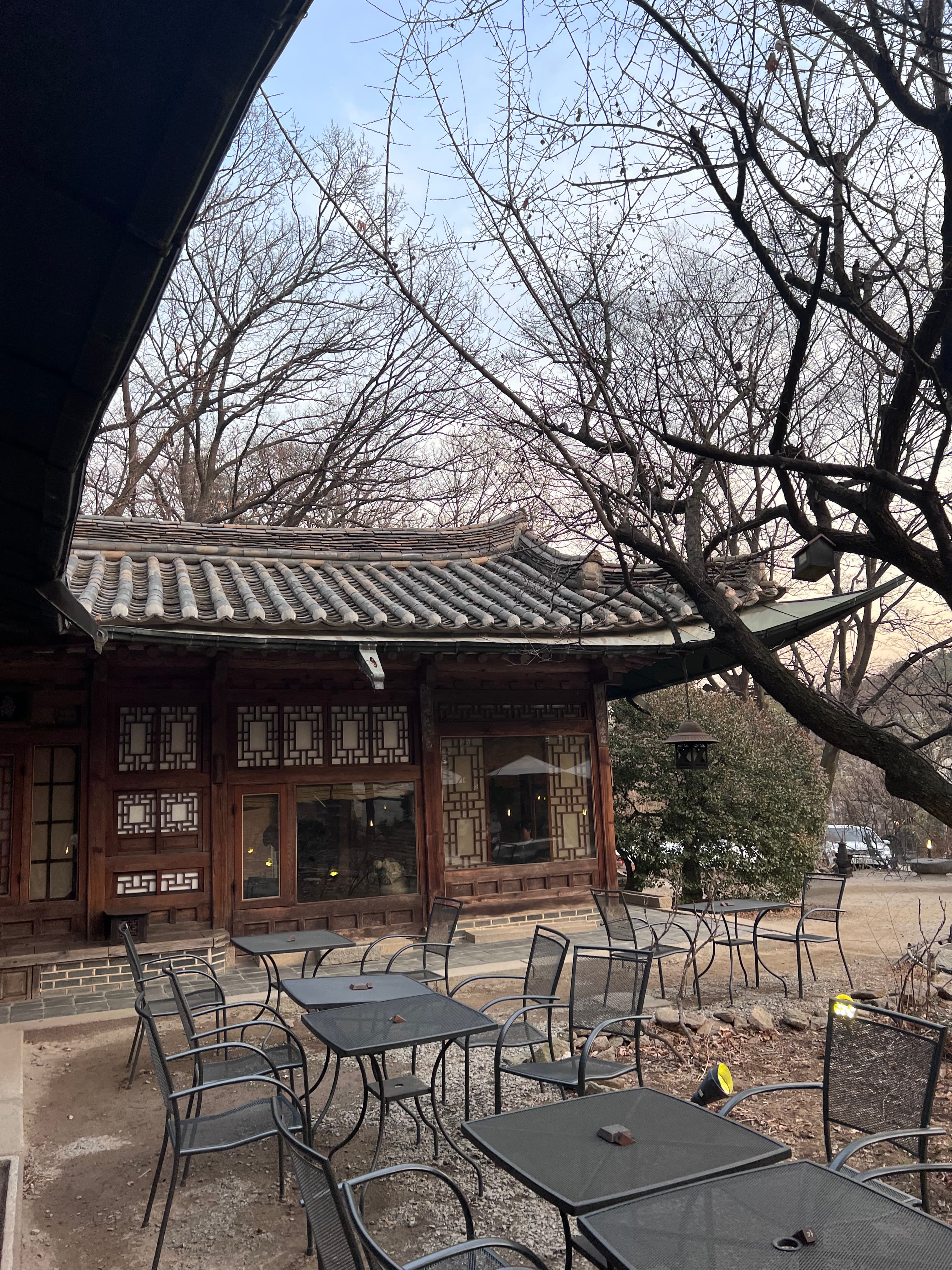 Traditional hanok building and tiled roof in a quiet Seoul winter courtyard