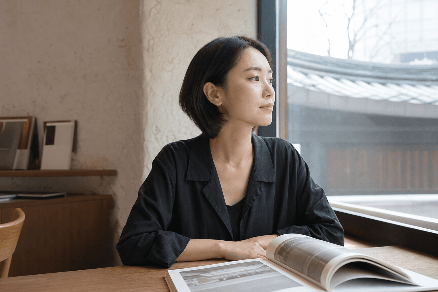 Close-up of serum being dropped into hands against a peach background