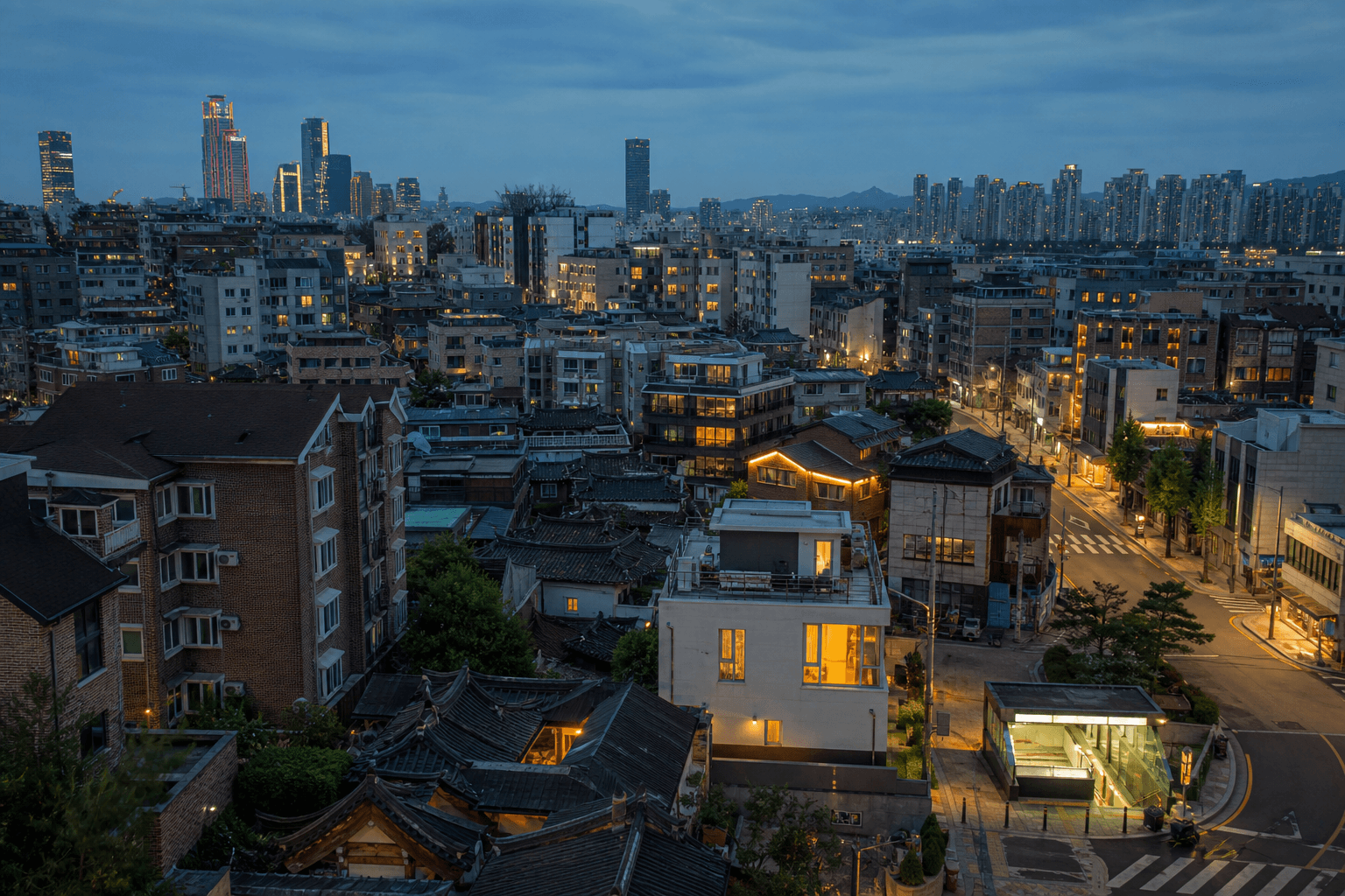 Seoul neighborhoods with hanok roofs, low-rise homes and towers at blue hour